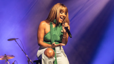 Hair Artistry in Motion: Mickey Guyton’s 2025 ACM Wig Evolution